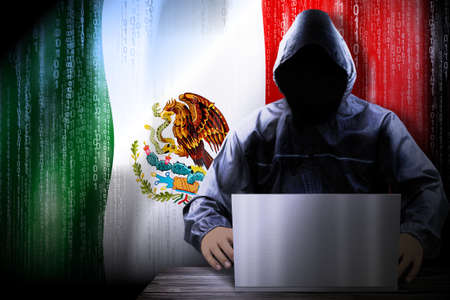 Anonymous hooded hacker, flag of Mexico, binary code - cyber attack concept
