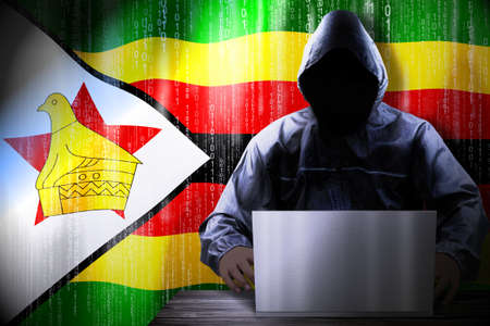Anonymous hooded hacker, flag of Zimbabwe, binary code - cyber attack concept