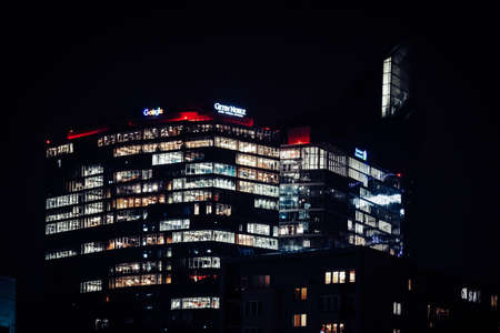 February 2nd, 2022 - Poland, Warsaw - Modern office buidlings, night photographのeditorial素材