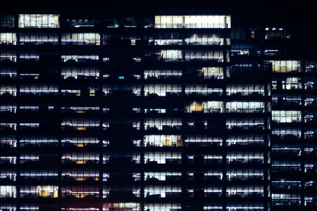 Office building with glass facade - night photographのeditorial素材
