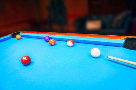 Billiards game - white and colorful balls on a tableの写真素材