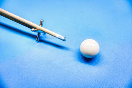 Billiards game - white ball and a cueの写真素材