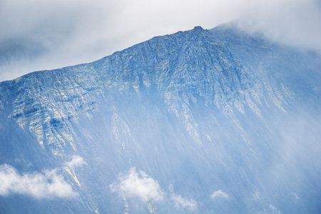 Fog and mist over mountains in Iceland - HDR photographの写真素材