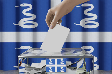 Snake Flag of Martinique flag, hand dropping ballot card into a box - voting/ election concept - 3D illustrationの写真素材