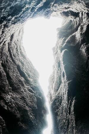 Rocks and sky in Raudfeldsgja Cave on Snaefellsnes Peninsula in Iceland