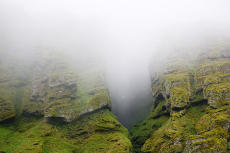 Rocks and fog at Raudfeldsgja Gorge on Snaefellsnes Peninsula in Icelandの写真素材