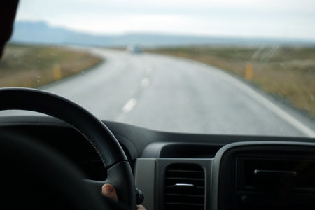 Driving a car - perspective of a driver - bokeh effectの写真素材