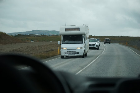 Driving a car - perspective of a driverの写真素材