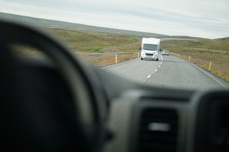 Driving a car - perspective of a driverの写真素材