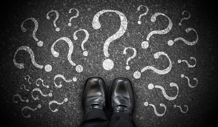 Black business shoes and many question marks - lost conceptの写真素材