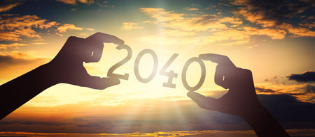 2040 - human hands holding black silhouette year numberの写真素材
