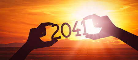 2041 - human hands holding black silhouette year numberの写真素材