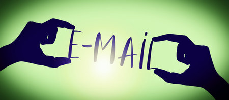 E-mail - human hands holding black silhouette word, gradient backgroundの写真素材