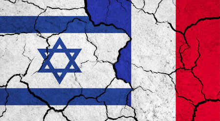Flags of Israel and France on cracked surface - politics, relationship conceptの写真素材