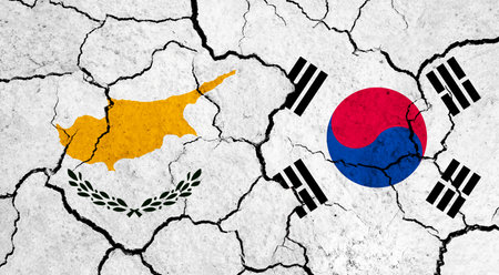 Flags of Cyprus and South Korea on cracked surface - politics, relationship conceptの写真素材