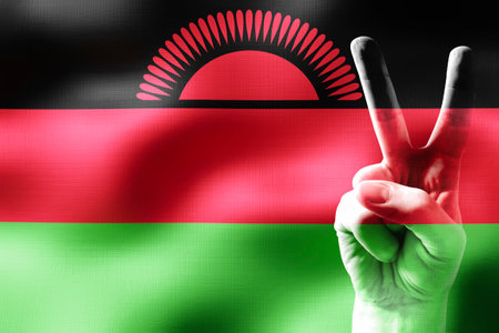 Malawi - two fingers showing peace sign and national flagの写真素材