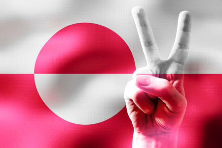 Greenland - two fingers showing peace sign and national flagの写真素材