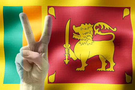 Sri Lanka - two fingers showing peace sign and national flagの写真素材