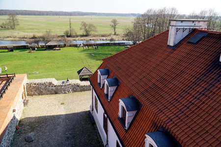Liw, Poland - March 10th, 2024 - Medieval ducal castle - view at patio and Liwiec Riverのeditorial素材