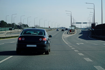 Car drives on a highway