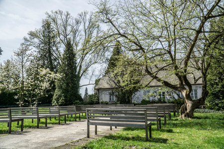 Zelazowa Wola, Poland - April 7th, 2024 - Manor house and benches - birthplace of Frederic Chopinのeditorial素材