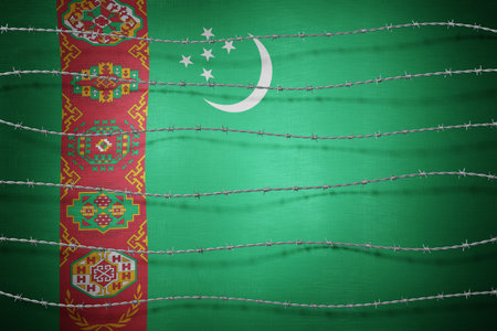 Turkmenistan flag and barbed wire - 3d illustrationの写真素材