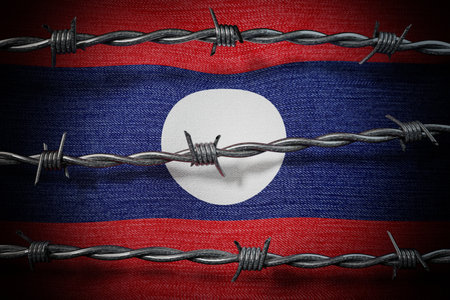 Laos flag and barbed wire - 3d illustrationの写真素材