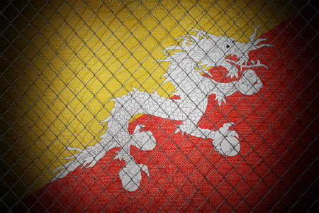 Bhutan flag and wire mesh fence - 3d illustrationの写真素材