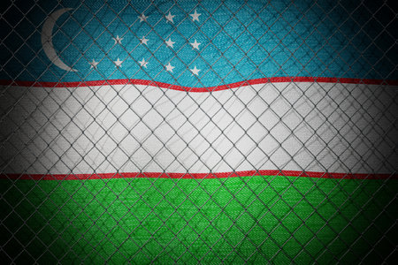 Uzbekistan flag and wire mesh fence - 3d illustrationの写真素材