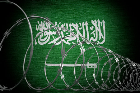 Barbed wire and flag of Saudi Arabia - 3d illustrationの写真素材