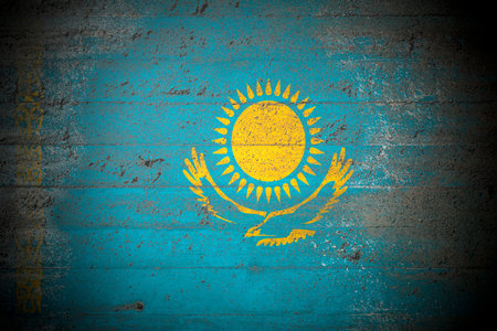 Flag of Kazakhstan on rough concrete wallの写真素材