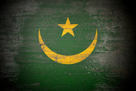 Flag of Mauritania on rough concrete wallの写真素材