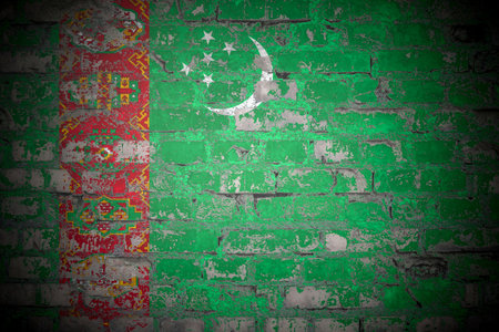 Flag of Turkmenistan on brick wallの写真素材
