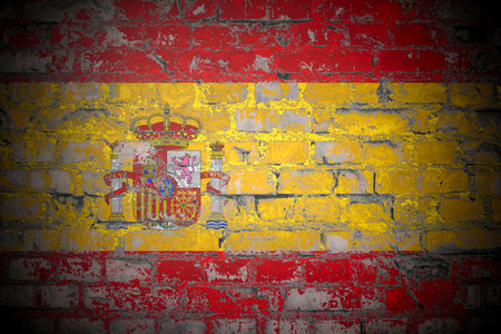 Flag of Spain on brick wallの写真素材