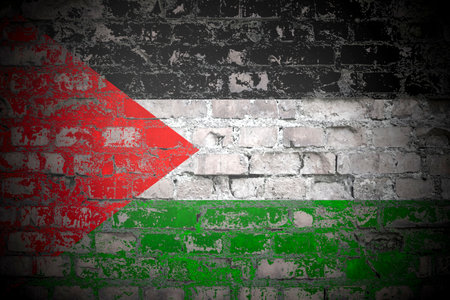 Flag of Palestine on brick wallの写真素材