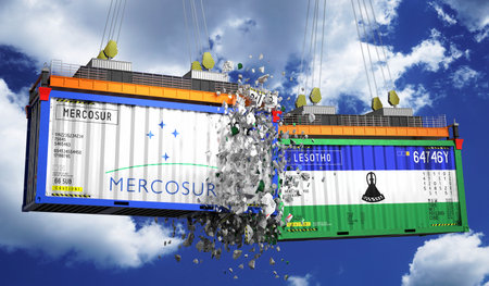 Crashing cargo containers with flags of Mercosur and Lesotho - 3D illustrationの写真素材
