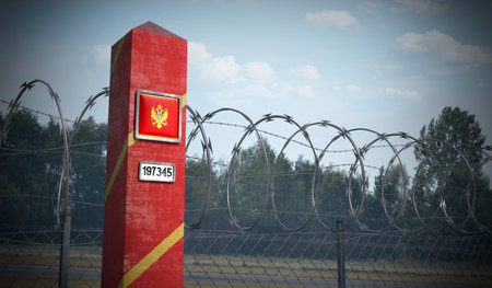 Border post with flag of Montenegro - 3D illustration