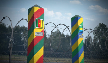 Border posts with flags of Cameroon and Gabon - 3d illustrationの写真素材