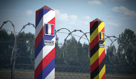 Border posts with flags of France and Belgium - 3d illustrationの写真素材