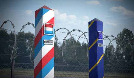 Border posts with flags of Luxembourg and European Union - 3d illustrationの写真素材