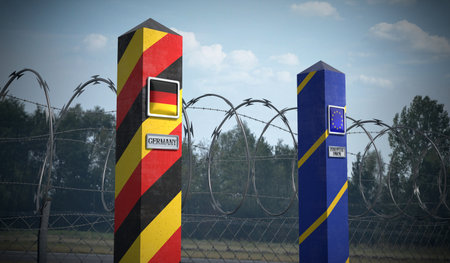 Border posts with flags of Germany and European Union - 3d illustrationの写真素材