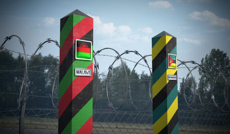 Border posts with flags of Malawi and Mozambique - 3d illustrationの写真素材