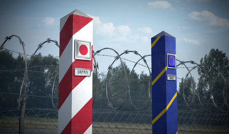 Border posts with flags of Japan and European Union - 3d illustrationの写真素材