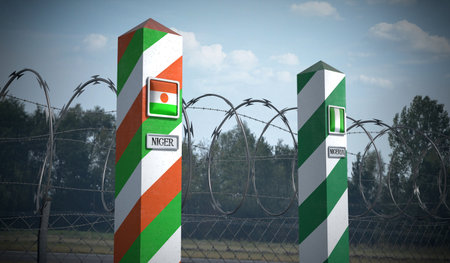 Border posts with flags of Niger and Nigeria - 3d illustrationの写真素材