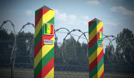 Border posts with flags of Senegal and Guinea - 3d illustrationの写真素材