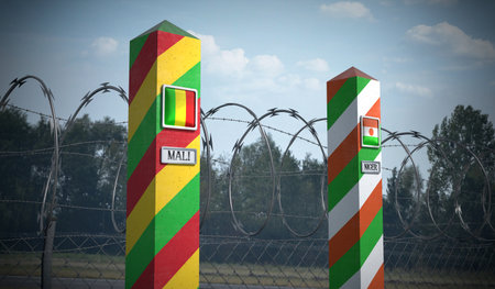 Border posts with flags of Mali and Niger - 3d illustration