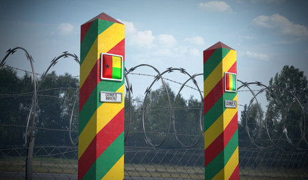 Border posts with flags of Guinea Bissau and Guinea - 3d illustrationの写真素材