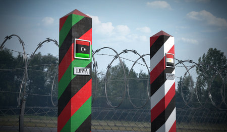 Border posts with flags of Libya and Egypt - 3d illustrationの写真素材