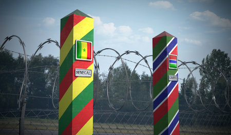Border posts with flags of Senegal and Gambia - 3d illustrationの写真素材
