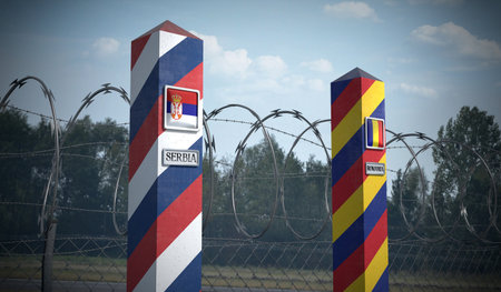 Border posts with flags of Serbia and Romania - 3d illustrationの写真素材